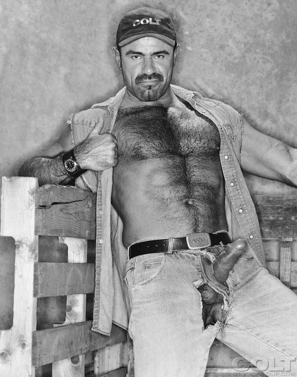 Big hairy gay bear in vintage photo session.